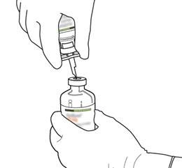 A close-up of a hand holding a syringe

Description automatically generated