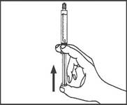 A hand holding a syringe

Description automatically generated